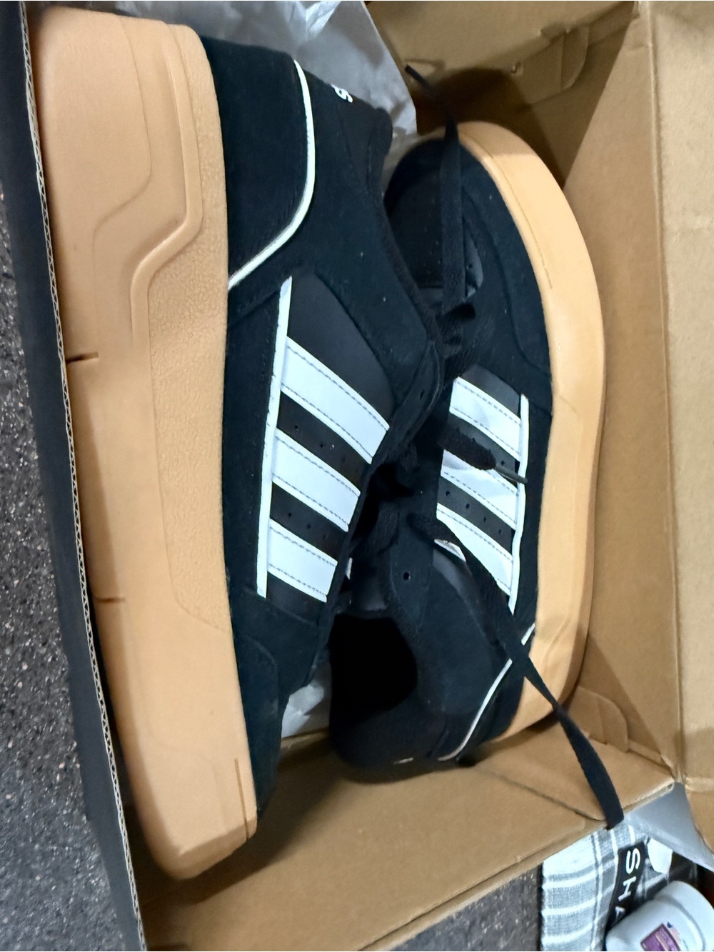 adidas women’s Black and White Sneakers with Gum Sole